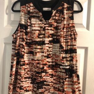 Spattered like peach and black design sleeveless blouse